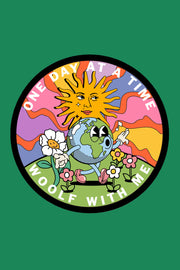 A colorful embroidered patch with a sun, moon, and stars design, featuring the text 'ONE DAY AT A TIME' and the brand logo 'WOOLF WITH ME'.