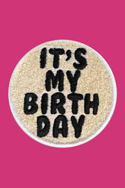 Round patch with 'It's My Birthday' text on a pink background