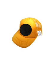 Yellow cap with a black circle on a white background