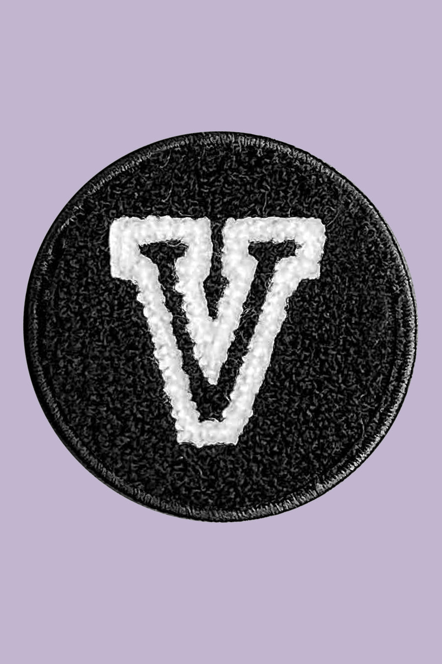 Black patch with a white 'V' symbol on a purple background