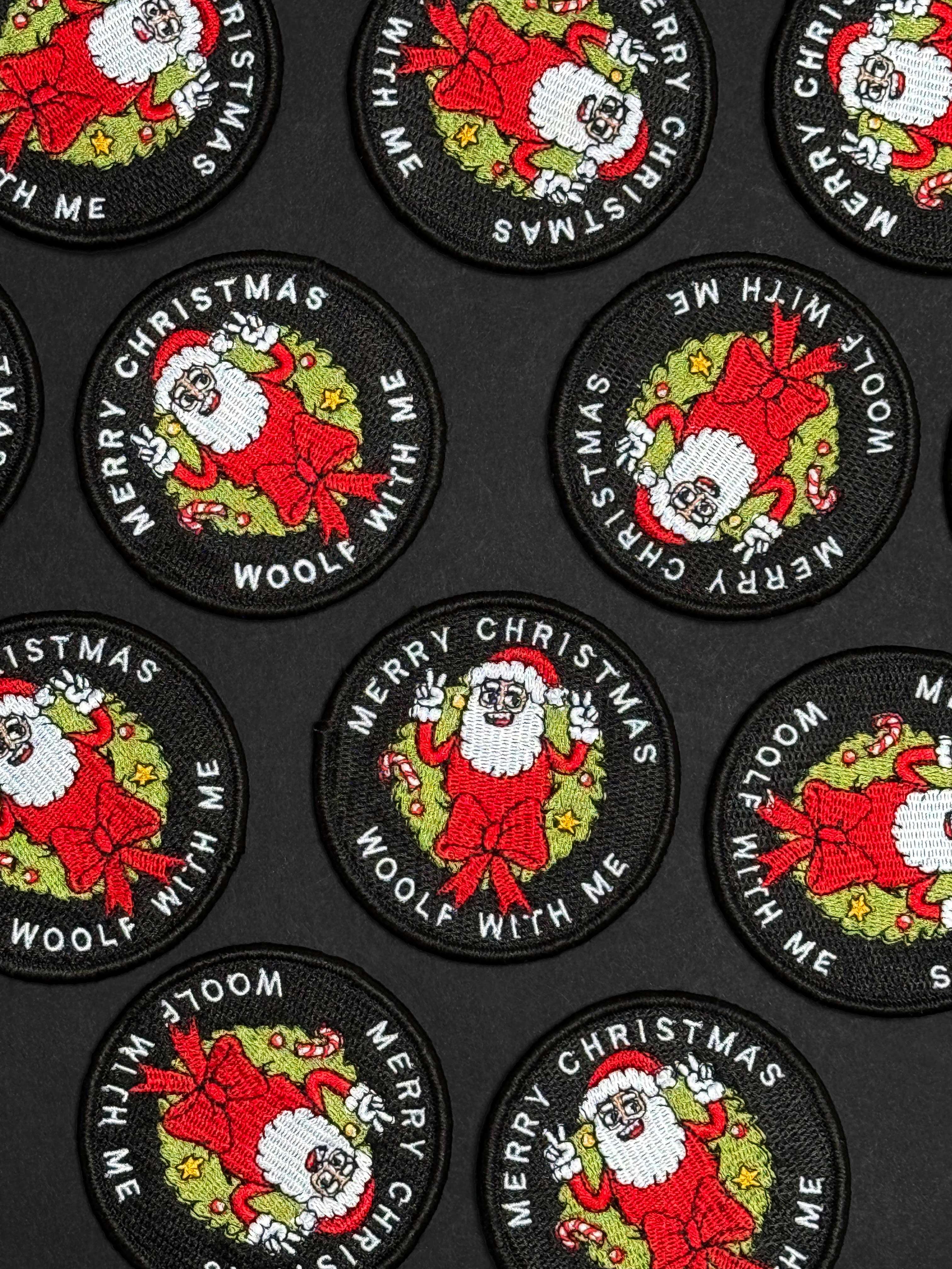 Collection of Christmas-themed patches with Santa Claus on a black background