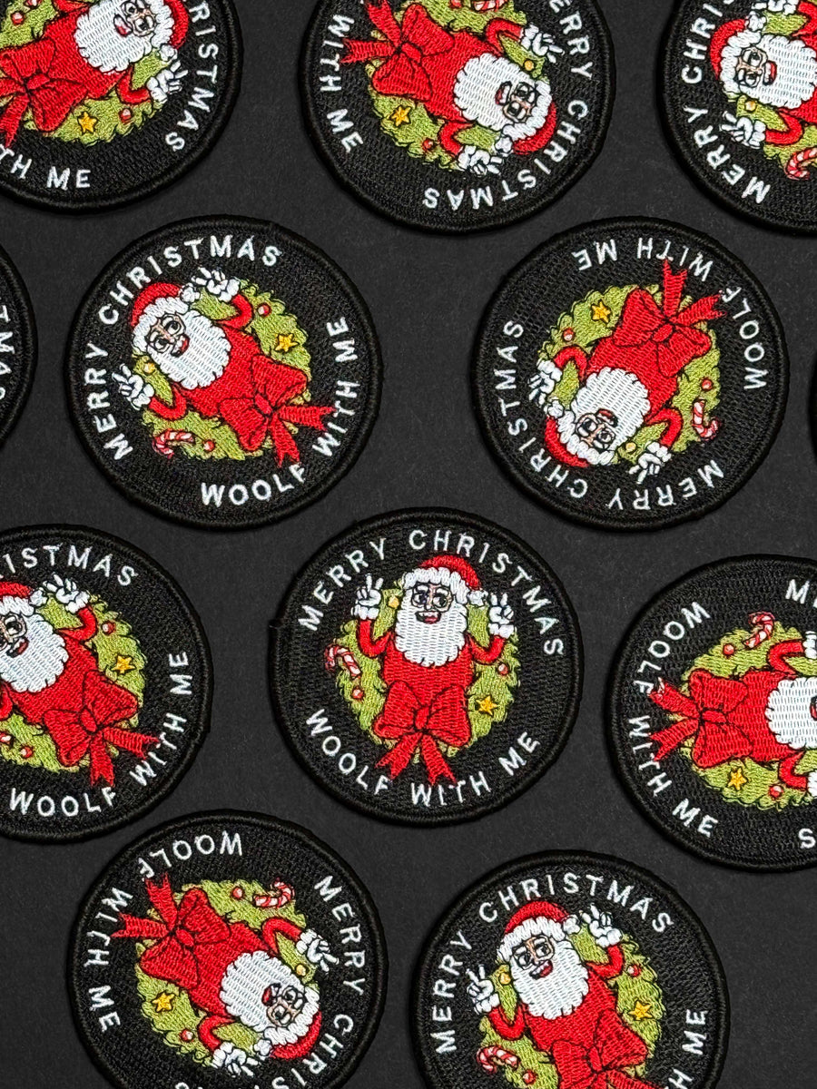 Collection of Christmas-themed patches with Santa Claus on a black background